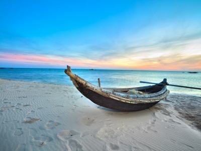 Old-fisherman-boat-at-sunrise-time-